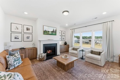 Beautifully maintained 3-bedroom, 2.5-bath home built in 2024 on Edgewater Golf Club in South Carolina - for sale on GolfHomes.com, golf home, golf lot