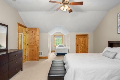 Stunning, custom-built log home overlooking the 16th tee & on Cedar River Golf Course in Michigan - for sale on GolfHomes.com, golf home, golf lot