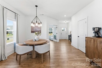 Beautifully maintained 3-bedroom, 2.5-bath home built in 2024 on Edgewater Golf Club in South Carolina - for sale on GolfHomes.com, golf home, golf lot