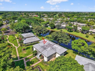 Elegant Country Club Living - Spacious 2-Bedroom + Den with Lake on Hunters Run Golf and Country Club in Florida - for sale on GolfHomes.com, golf home, golf lot
