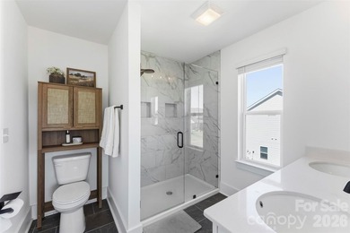 Beautifully maintained 3-bedroom, 2.5-bath home built in 2024 on Edgewater Golf Club in South Carolina - for sale on GolfHomes.com, golf home, golf lot