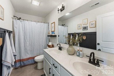 Beautifully maintained 3-bedroom, 2.5-bath home built in 2024 on Edgewater Golf Club in South Carolina - for sale on GolfHomes.com, golf home, golf lot