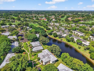 Elegant Country Club Living - Spacious 2-Bedroom + Den with Lake on Hunters Run Golf and Country Club in Florida - for sale on GolfHomes.com, golf home, golf lot