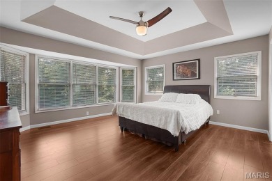 This atrium ranch sits on a premium cul-de-sac lot backing to on Bear Creek Golf Club in Missouri - for sale on GolfHomes.com, golf home, golf lot