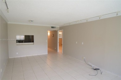 BEAUTIFUL 2 BED, 2 BATH FIRST FLOOR CONDO W GORGEOUS WATER VIEWS on Pine Island Ridge Country Club in Florida - for sale on GolfHomes.com, golf home, golf lot