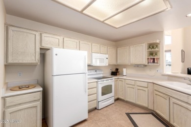 This great furnished  end unit  2 bedroom 1.75 bath condo has a on Fountain of the Sun Country Club in Arizona - for sale on GolfHomes.com, golf home, golf lot