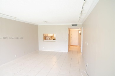 BEAUTIFUL 2 BED, 2 BATH FIRST FLOOR CONDO W GORGEOUS WATER VIEWS on Pine Island Ridge Country Club in Florida - for sale on GolfHomes.com, golf home, golf lot