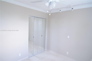 BEAUTIFUL 2 BED, 2 BATH FIRST FLOOR CONDO W GORGEOUS WATER VIEWS on Pine Island Ridge Country Club in Florida - for sale on GolfHomes.com, golf home, golf lot
