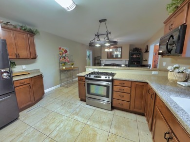 Cute, cute, cute! This beautifully-maintained one-level on Danville Country Club in Kentucky - for sale on GolfHomes.com, golf home, golf lot