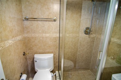 BEAUTIFUL 2 BED, 2 BATH FIRST FLOOR CONDO W GORGEOUS WATER VIEWS on Pine Island Ridge Country Club in Florida - for sale on GolfHomes.com, golf home, golf lot