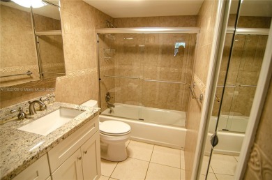 BEAUTIFUL 2 BED, 2 BATH FIRST FLOOR CONDO W GORGEOUS WATER VIEWS on Pine Island Ridge Country Club in Florida - for sale on GolfHomes.com, golf home, golf lot