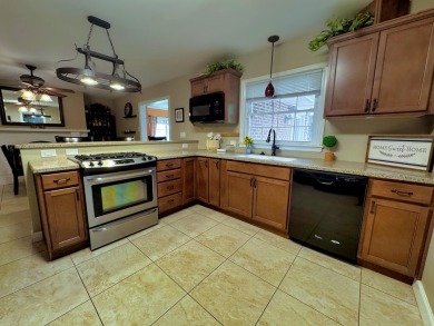 Cute, cute, cute! This beautifully-maintained one-level on Danville Country Club in Kentucky - for sale on GolfHomes.com, golf home, golf lot