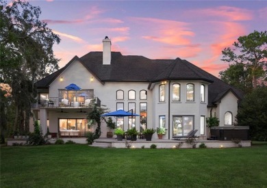This stunning residence blends timeless European elegance with on Oak Grove Island Golf and Country Club in Georgia - for sale on GolfHomes.com, golf home, golf lot