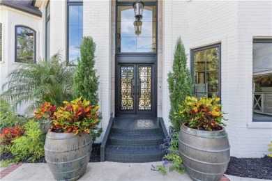 This stunning residence blends timeless European elegance with on Oak Grove Island Golf and Country Club in Georgia - for sale on GolfHomes.com, golf home, golf lot