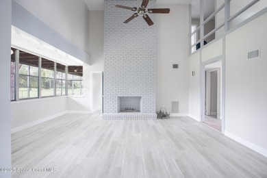 A world of possibility and golf-course living awaits in this on Rockledge Country Club in Florida - for sale on GolfHomes.com, golf home, golf lot