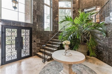 This stunning residence blends timeless European elegance with on Oak Grove Island Golf and Country Club in Georgia - for sale on GolfHomes.com, golf home, golf lot