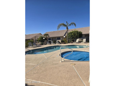 This great furnished  end unit  2 bedroom 1.75 bath condo has a on Fountain of the Sun Country Club in Arizona - for sale on GolfHomes.com, golf home, golf lot