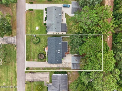 Well priced with motivated sellers-an excellent opportunity in a on Thistle Golf Club in North Carolina - for sale on GolfHomes.com, golf home, golf lot