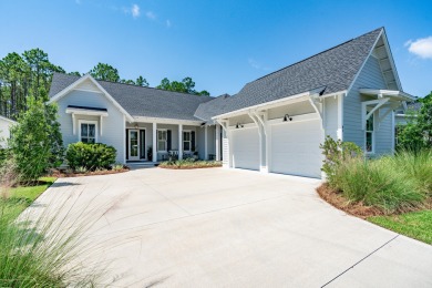 This elegant single-story Hawthorne plan by Huff Homes combines on Origins Golf Club in Florida - for sale on GolfHomes.com, golf home, golf lot