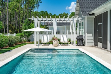 This elegant single-story Hawthorne plan by Huff Homes combines on Origins Golf Club in Florida - for sale on GolfHomes.com, golf home, golf lot