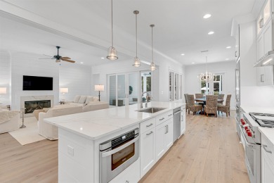 This elegant single-story Hawthorne plan by Huff Homes combines on Origins Golf Club in Florida - for sale on GolfHomes.com, golf home, golf lot