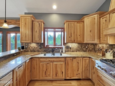 Set back on a flat 2-acre lot overlooking the 3rd Fairway at the on Pole Creek Golf Club in Colorado - for sale on GolfHomes.com, golf home, golf lot