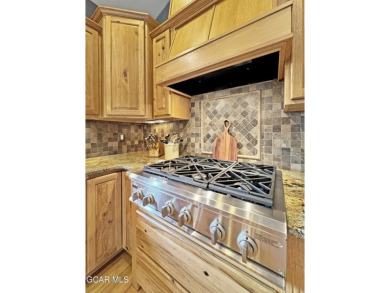 Set back on a flat 2-acre lot overlooking the 3rd Fairway at the on Pole Creek Golf Club in Colorado - for sale on GolfHomes.com, golf home, golf lot