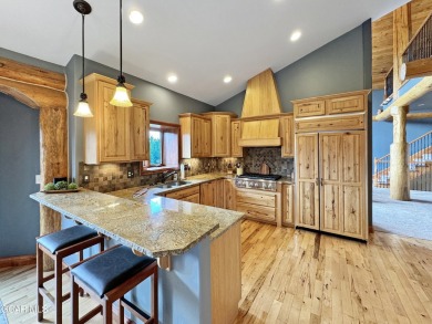 Set back on a flat 2-acre lot overlooking the 3rd Fairway at the on Pole Creek Golf Club in Colorado - for sale on GolfHomes.com, golf home, golf lot