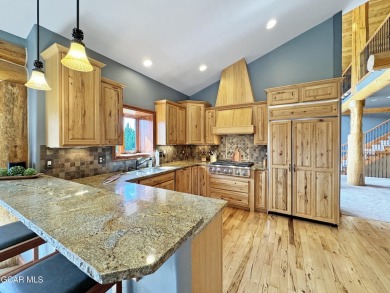 Set back on a flat 2-acre lot overlooking the 3rd Fairway at the on Pole Creek Golf Club in Colorado - for sale on GolfHomes.com, golf home, golf lot