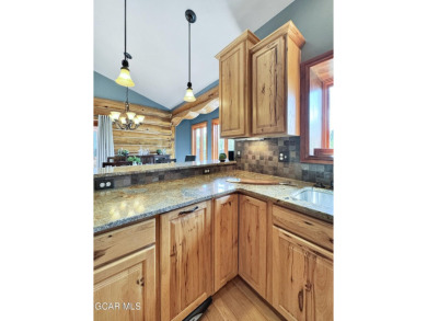 Set back on a flat 2-acre lot overlooking the 3rd Fairway at the on Pole Creek Golf Club in Colorado - for sale on GolfHomes.com, golf home, golf lot