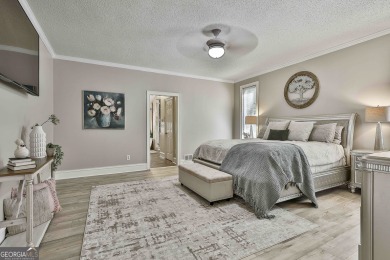 Welcome to this exquisite Stoney Brook home offering 5 bedrooms on Canongate At Flat Creek Club in Georgia - for sale on GolfHomes.com, golf home, golf lot