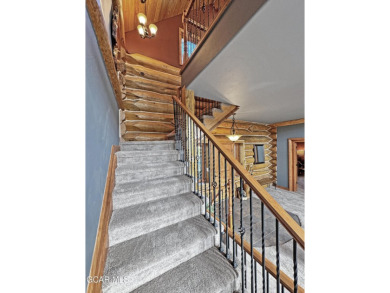 Set back on a flat 2-acre lot overlooking the 3rd Fairway at the on Pole Creek Golf Club in Colorado - for sale on GolfHomes.com, golf home, golf lot