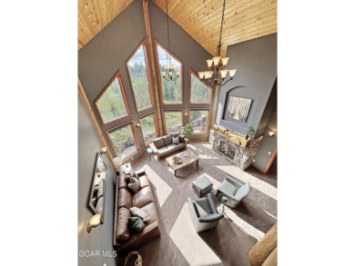 Set back on a flat 2-acre lot overlooking the 3rd Fairway at the on Pole Creek Golf Club in Colorado - for sale on GolfHomes.com, golf home, golf lot