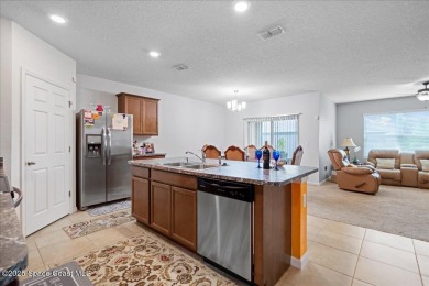 Welcome to this charming 4-bedroom, 2-bath home situated on a on Cane Creek Reserve Golf Course in Florida - for sale on GolfHomes.com, golf home, golf lot