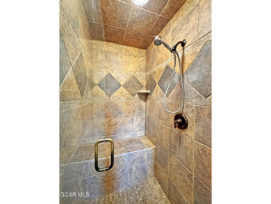 Set back on a flat 2-acre lot overlooking the 3rd Fairway at the on Pole Creek Golf Club in Colorado - for sale on GolfHomes.com, golf home, golf lot