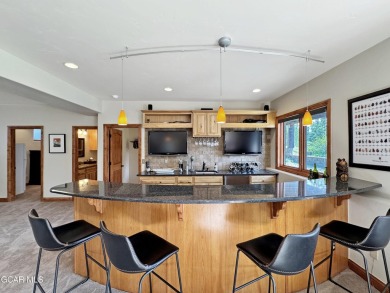 Set back on a flat 2-acre lot overlooking the 3rd Fairway at the on Pole Creek Golf Club in Colorado - for sale on GolfHomes.com, golf home, golf lot