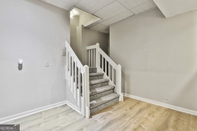 Welcome to this exquisite Stoney Brook home offering 5 bedrooms on Canongate At Flat Creek Club in Georgia - for sale on GolfHomes.com, golf home, golf lot