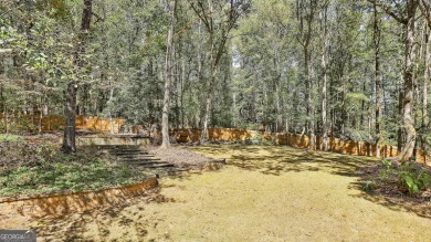 Welcome to this exquisite Stoney Brook home offering 5 bedrooms on Canongate At Flat Creek Club in Georgia - for sale on GolfHomes.com, golf home, golf lot