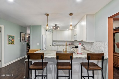 This beautifully updated 2-bed, 2-bath home w/a 2-car garage on Sun Lakes Country Club in Arizona - for sale on GolfHomes.com, golf home, golf lot