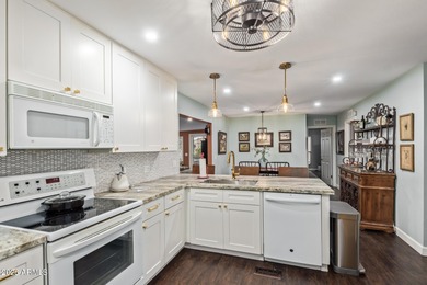 This beautifully updated 2-bed, 2-bath home w/a 2-car garage on Sun Lakes Country Club in Arizona - for sale on GolfHomes.com, golf home, golf lot