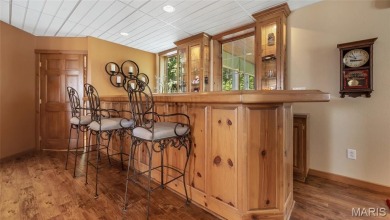Welcome to your dream home--a beautifully updated, one-of-a-kind on Triple Lakes Golf Course in Illinois - for sale on GolfHomes.com, golf home, golf lot