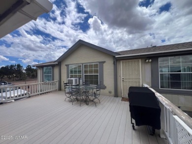 Fully furnished home in White Mountain Lakes on a spacious 0 on Silver Creek Golf Club in Arizona - for sale on GolfHomes.com, golf home, golf lot
