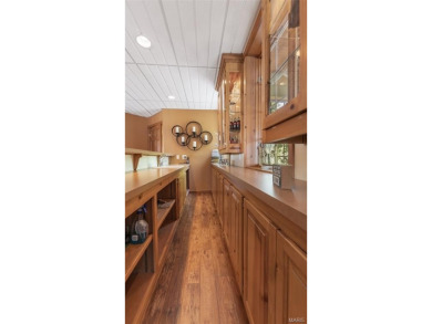 Welcome to your dream home--a beautifully updated, one-of-a-kind on Triple Lakes Golf Course in Illinois - for sale on GolfHomes.com, golf home, golf lot