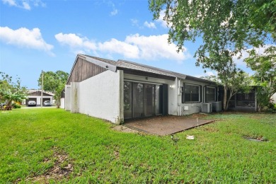 Nestled in the heart of the vibrant and rapidly growing Tamarac on Colony West Country Club in Florida - for sale on GolfHomes.com, golf home, golf lot