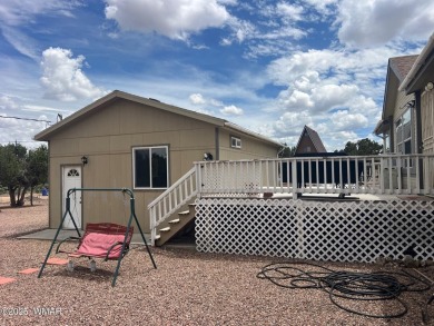 Fully furnished home in White Mountain Lakes on a spacious 0 on Silver Creek Golf Club in Arizona - for sale on GolfHomes.com, golf home, golf lot