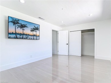 One or more photo(s) was virtually staged. Located in the on The Forest Country Club in Florida - for sale on GolfHomes.com, golf home, golf lot