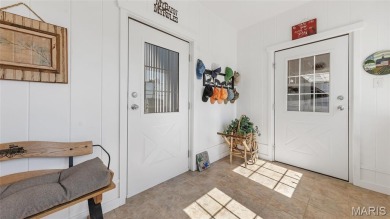 Welcome to your dream home--a beautifully updated, one-of-a-kind on Triple Lakes Golf Course in Illinois - for sale on GolfHomes.com, golf home, golf lot