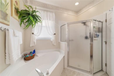 Beautiful 2/2/2 plus TWO FLEX ROOMS and GOLF CART GARAGE in on Ocala Palms Golf and Country Club in Florida - for sale on GolfHomes.com, golf home, golf lot