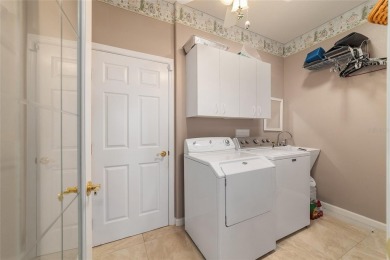 Beautiful 2/2/2 plus TWO FLEX ROOMS and GOLF CART GARAGE in on Ocala Palms Golf and Country Club in Florida - for sale on GolfHomes.com, golf home, golf lot