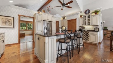 Welcome to your dream home--a beautifully updated, one-of-a-kind on Triple Lakes Golf Course in Illinois - for sale on GolfHomes.com, golf home, golf lot
